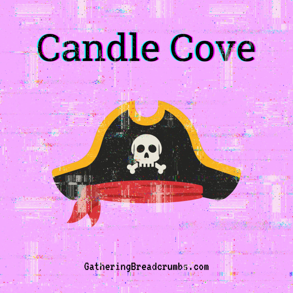 A pirate hat with the words Candle Cove